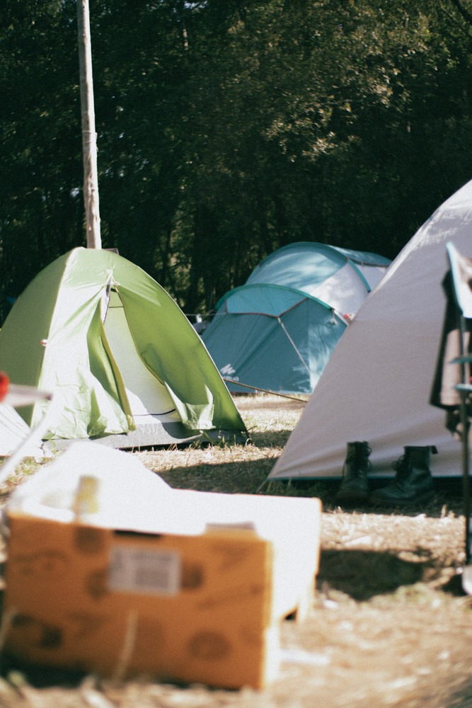 https://www.pexels.com/photo/photograph-of-tents-on-the-ground-11113247/